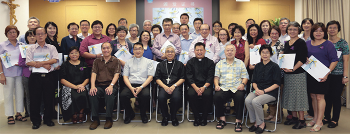 Graduates from the Certificate in Theology (Mandarin) programme pose for a group shot with Archbishop William Goh. Photo: CTIS.